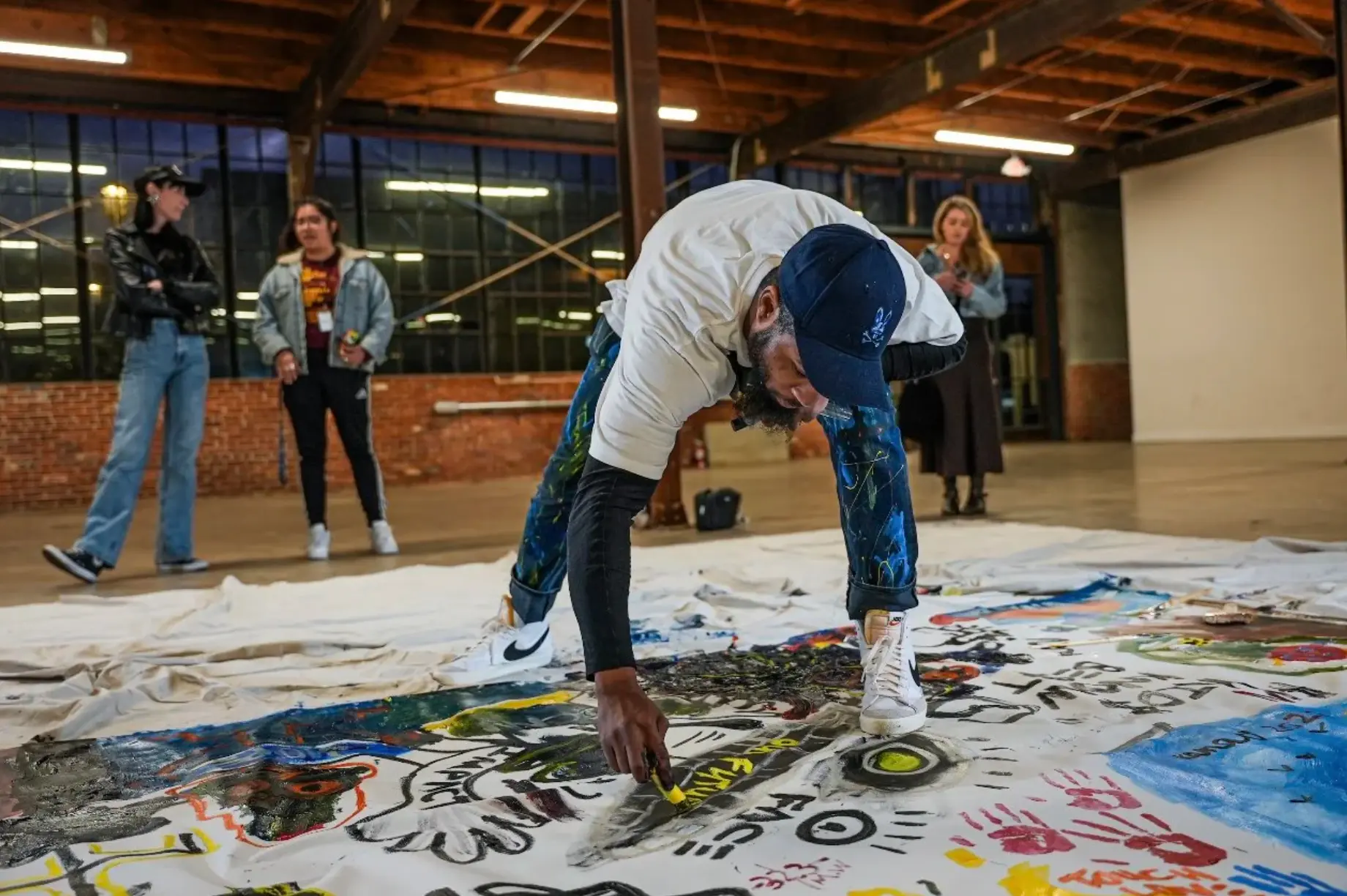 Halim Flowers painting during Miami Art Week.